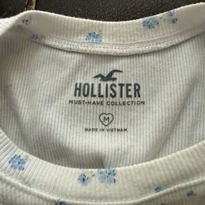 Hollister Cream Top with Blue Floral Pattern